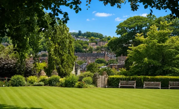 A landscape view overlooking local residential property roofs and the green hillsides of Guildford, a primary town within our Surrey asbestos removal service radius.